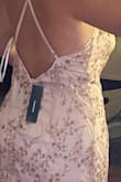 This dress is everything!! The color is stunning and the material is too. It was just a little too long on me since my height is 5'0" and a little loose on the waist for my preference but other than that this dress is pretty cute. - Karilyn R.