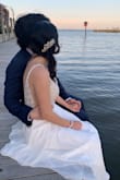 The dress is beautiful, perfect and extremely unique. Everyone was amazed with this dress couldn't believe I bought it online. It was a little large for me I'm just 5" so It had to be hammered otherwise like I said it was perfect. I love it. - Elvia B.