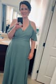 This dress is so incredibly flattering, even the bride of the wedding I wore it to complimented it!! It's so well made, has good weight to it but isn't heavy, and I felt so beautiful wearing it. Love love love this dress!! It's very long. I'm 5'9", wore 4 inch heels and it still brushed the floor. - Colleen K.