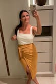 This bodysuit is great! I love how it's a little thicker material, helps smooth things out and looks and feels like good quality. I've worn it with skirts and jeans and works well with both! I also love that I can wear a regular bra with it, didn't need strapless or sticky bra. Definitely will want to get it in more colors. - Jaclyn V.