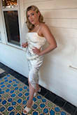 I got this dress for going out a night at my bachelorette weekend, I was so pleasantly surprised how well it fit me. It looks so classy. I will say it's the image online makes it look more white, but it is definitely ivory. The overall fit is comfortable and the material has a little give it to it. I loved this dress and if you are a bride looking for something for your bachelorette or bridal shower, I would 100% recommend this dress! - Natalie D.