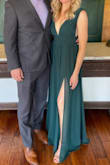 I originally ordered a S, which ended up being too big/loose up top. The XS fit much better, although I had to make sure I was always sitting up straight, because of I slightly leaned forward, my bra cups would show. The straps also fell off my shoulders a few times. And while I'm 5'6", the dress was slightly long with heels, so someone who is shorter would have to get it hemmed. That being said, the color was beautiful and I received many compliments on it! - Chelsie B.