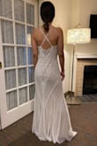 This dress is a show stopper to me, I love it so much. Unfortunately, it fits me a full size too large, and its completely out of stock at the moment, so exchanging for a smaller one is not an option and I think having it altered would be too much. The length is great for a wedding in my opinion, I am wearing 2.5 inch heels and still reaches the floor.
If you see this dress and its in your size, don't even think about it, go for it! - Alma R.