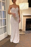 This dress looks so much better in person than in the pictures, I was surprised by the sequins when i saw it, it really elevates the look. The length is also perfect, I am wearing a small heel and the dress still reached the floor. 
Very pleased with this look and fit - Alma R.
