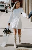 I loved this dress for my city hall elopement! It was extremely comfortable and just what I was looking for. It's a true white color but not see through. I paired it with a pearl veil and white tall boots for a chic look. :) - Riley H.