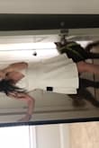 I love it. Beautiful and sexy dress. I'll be wearing it to my wedding dinner! Material is so good and it's not see through at all. It has at two layers on the skirt area which is pretty cool! The layer underneath it it's thin so no problem at all with it!
Definitely love it! - Mireya A.