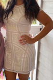 Medium fit great. Wore this dress on my bachelorette and received a lot of compliments. I was comfortable and material was breathable. Beautiful beaded design. - Emily G.