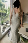 This dress is beautiful. So detailed and high class! Looks much more expensive than it is. - Lindsay L.