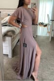 I absolutely love this dress! I bought this as a bridesmaids dress and honestly I didn't even shop around for options because as soon as I saw this dress, I knew it was the one. I like that it's not super revealing, but also has a flirty aspect to it with the slit and slightly open back and sides.
I do agree with other reviews that it's extremely long. It's basically made for people who are 5'9", otherwise you will need to get quite a few inches hemmed off. I am normally a size xs/s and the xs fit perfectly. In fact, I still had some room to breathe.
My only other con about this dress, besides the length is the zipper. My husband thinks it would have been better had it been a hidden zipper. I agree that a hidden zipper like the side zipper probably would've been more attractive, but it doesn't bother me the way it is. However, it is hard to zip up. It seems like a cheap zipper. But other than that, I still love this dress! - Athena B.
