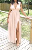 Ordered the blush color in a small. I am 5'9 145lbs and 34D for reference. The dress touched the floor even in 4-inch heels. It was the perfect fit! Did not have to alter in any way. The waist area was the perfect amount of tightness to keep the girls up. However, I did use boob tape for support. Wore this dress as a guest to a wedding. Everyone complimented me! - Lorena R.