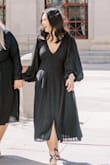 I am in love with this dress, it is so flattering and flowy. I was a little nervous the S wouldn't fit me but it was actually a little roomy! Depending on the brand I go between a S and M. If you're similar I would recommend going with the smaller size. - Joanne H.
