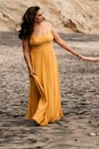 I actually went up to the Xl only because my shoulders are wide and it didn't fit great on my bust in the Large. This dress is gorgeous though, and super comfortable. Got so many compliments - Michelle C.