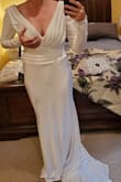 This dress just didn't have the laying, swaying effect I anticipated from the model. Did love the drop back. I generally find issues with the bodice or straps of dresses due to my height being all legs. On my body the breast material was too loose and shoulder area. - Jeana D.