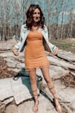 If you are looking for a dress that stands out, this is it. I love the linen materials. It's true to size and bra friendly. It hugs in all the right places. I got so many compliments! Definitely a must have. - Megan D.