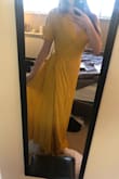 I bought this dress for a wedding I am in and I am so excited to wear it! It is flowy and breathable. The color is flawless! I ordered a small and it fits fine, but I think the x-small would have been more true to my fit. But I also have no bust and a small waist lol. Regardless the small is a great fit too! I'll just need to wear heels as it is rather long. I love it though and will definitely be wearing more than to just this wedding! - Kira H.