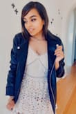 This is the absolute perfect dress for Spring. It'd say it's more ivory than blush pink, but it's a stunning dress. Perfect to pair with chunky black boots and a motorcycle jacket for a more bold look or with nude/white heels for a classic look. Highly recommend and have gotten many compliments on it. - Sarah C.