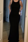 I wore this as a guest to a formal wedding and it was perfect! Very classy and simple front with a gorgeous back! True to size, lots of stretch! - Jenny P.