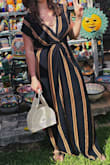 I wore this on my honeymoon to Mexico and got so many compliments. I threw it over a swimsuit but it looked great as an everyday dress. I made the mistake of washing it and throwing it in the dryer and it shrunk. I planning on reordering it because I love it so much. - Lena T.