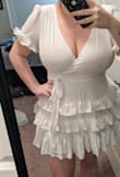 I bought this dress for my bridal shower and it is everything I could have asked for! So comfortable and fits perfect. I was worried that having a larger bust would make this dress too revealing but it covers well! Definitely a little short, particularly in the back, but still a gorgeous and flattering dress! Ordered a size medium. - Samantha W.