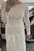This dress was beautiful and had great material for the price. I went off of the other reviews and the models size and ordered an XS. It fit, but I would have been more comfortable in a small. I'm 5'7" and even barefoot you could see my feet. There's no way I would have been able to wear heels with this dress which made me sad. But if you're okay with that then I highly recommend this dress. - Katrina L.
