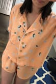 I like to wear my PJ loose, so I ordered these in size M (I'm size S Lulus). The material is so soft, and airy. Love the shirt with a front pocket, and the high cut on the side of these shorts and they are stretchy and comfortable! Recommended! - Jinna R.