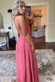 I ordered this dress to wear to a wedding and it looked absolutely stunning! So many compliments and the color fit perfectly for a spring wedding. The back was BEAUTIFUL and my favorite. I was so worried about how the dress would fit but it fit perfectly! I ordered a size down because I normally wear a medium so I would suggest ordering a size down. But all things aside best dress, the material was great, and once again the back is FLAWLESS! - Jordan N.