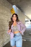 I got so many compliments on this lavender blazer I am obsessed! I wore it with jean shorts and heels but you can definitely wear it in an office space also! It runs a little big which I actually love so it's comfy for all day wear. It is slightly cropped but not too much. Overall, I'm super happy with it :)

Ps- Posted in it on IG! Check it out if you'd like (@sincerelymonicaa) - Monica G.