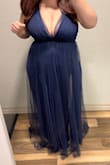 I loved the dress! It was supper flattering in all of the right areas. I did have to have it hemmed, so it runs long! - Carolina F.