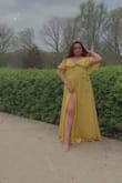 This dress is super beautiful but extremely difficult to put together. The button clasp would not stay closed so I had to use 2 safety pins. The belt was confusing to figure out. A bit too long as well. Overall it looked amazing and I received so many compliments! - Talia A.