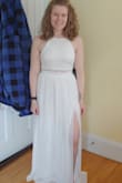 I am obsessed with this dress. My partner and I are planning a very small party to celebrate our marriage this summer, and this is exactly the vibe I was looking for. In terms of fit, the top was a little big and the bottom was a little snug, but neither enough to exchange the size. The skirt is pretty long, so I'm definitely going to have to get it hemmed. This pic is from trying it on straight out of the box. - Raphaela W.