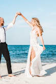 I got this dress for a redo on my wedding pictures for our 10 year anniversary since we didn't get real pictures for our original wedding. I LOVED this dress more then my original expensive dress!! My husband was also obsessed! When we posted pictures all anyone could talk about was the dress. It's completely see through with like a nude leotard that's slightly up your butt, so if it's not a beachy outdoor wedding it may be odd, but I loved it. I'm almost 5'10 and I was worried it would be short as is most things but it was perfect. - Caitlynn D.