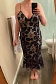 Good quality. A little loose. Would probably size down, but it's out of stock. Not very supportive in the bust for larger chested girls, so may need to get a strapless bra. Wearing it for an evening wedding in May! - Sarah H.