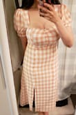 If you've ever tried on a Reformation dress, than you know the feel of this fabric isn't the softest. However, the design is gorgeous! I absolutely love the peachy pink and the retro vibe. As for fit, it is tight up top as my bust is large, but other than that I loved it and am glad I stuck to my regular size Medium. Must buy! - Jaynel C.