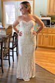 This dress fit me perfectly. I am typically between a small and a medium depending on the brand. I ordered a Medium and I don't even need to get it hemmed! I am bare foot in the picture, my shoes add a little height. The quality is 100% and looks far more expensive than the price. It looks so much better in person than in the online picture. Highly suggest. - Katherine R.