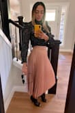 Love this skirt so much! Was wrinkly when I took it out of the package but the wrinkles fell out quickly after hanging it - Evelyn B.