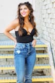 The best go-to black bodysuit for a night out!! Can be styled so many different ways and fits like a glove. Accentuates the chest while still being supportive, and I love the open back! Check it out on my insta - @likedbylyric - Melissa M.