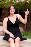 I bought this dress for my college senior photos and I absolutely love it. I looked everywhere for a dress in my size, being that I am a larger girl, it's normally a struggle and I expect things to be really tight but this dress is perfect. It offers a lot of support up top without squeezing me or leaving lines on my back. Would definitely recommend! - Julia V.