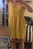 I like this dress a lot. The material seems sturdy and is breathable. The cut is a bit babydoll-ish because of my chest, but I don't mind that. I like that you can machine-wash it. Looks super cute with brown sandals and a denim jacket. Would buy this dress again. - Jenny B.