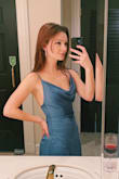 This dress was simple yet striking. The neckline and the leg slit were just the right amount of detail for me. I don't wear a lot of color and I was nervous to order a blue dress. BUT this blue is not super saturated and has purple undertones. I LOVED it! Great dress! 
Unfortunate I got red wine spilled on it at the wedding I wore it to. :( See photo. :( - Sadhbh R.