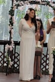 I absolutely love this dress. Wore it to my wedding. GOT A SIZE MEDIUM. looks beautiful. it is a little heavy because of the material but nothing crazy. It gave me Lana Del Rey vibes which was what I was going for!! I will say this, it can be a little see-through. I made the mistake of not wearing white shape wear underneath and my under wear was visible. But all in all I love it and I'm happy I chose it. I'm going to cut it into a mini dress next for my first new year's with my wife! - Juliana N.