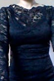 The dress in person is prettier than what you see in the picture. It looks so delicate and classy. The lace is so delicate and the fit and length is perfect. - Malenys C.