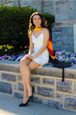This dress is adorable! I love the frills at the bottom. I used this for my graduation photos and it was amazing. The quality of the fabric is good and heavy. - Amy V.