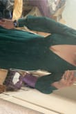 The bust has some stitching that was too high for my boob. Beautiful dress. Love the deep cut in the front. Very open back. Good quality material. - Melanie J.