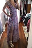 I am in love with this dress! I ordered a small and medium because I am in between sizes and I went with the medium due to it being a tad too tight around the bust. The side boob area is a little loose on me because I am very small chested for my frame lol, but other than that it is stunning, very flattering, flowy and comfy. High quality, rubber strips on the underside of the straps to keep it in place. I am planning on wearing it as a wedding guest next month and for my own engagement pics this summer. For reference it hits the floor perfectly in about 4in heels and I am 5'9. - Caprice L.