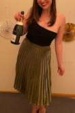 Pretty skirt, a little bit longer than the picture suggests and a deeper looking gold, but so comfortable and has nice movement. If you're on the fence about getting a medium versus a small, I would say go smaller since I'm a true medium and there was a little room. - Julia R.