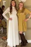 Absolutely love this dress! I wore it for my bridal shower and received so many compliments on it! Planning to wear it again for my rehearsal dinner. Not too heavy, but the material feels like it's good quality. I am 5'10" and ordered the large. It touched the ground when I was barefoot so I wore heels to keep it from dragging. - Racquel S.
