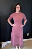 I bought this for a family/rehearsal dinner for next month. It fits great and has a slip under neither that helps keep a smooth appearance. - Lauren J.