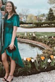 Color is beautiful and silhouette is flattering. Its a true wrap dress which is sometimes worrying when wearing for a formal event and dancing. I pull it over as far as possible which makes the neckline a bit skewed, so my only complaint is there should be more material to the interior wrap portion. - Becky T.