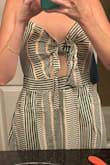 This dress was nothing like I imagined! The material was thin and stiff and the keyhole looked ridiculous on me. It felt more like a dress from shmamazon that wasn't authentic. It also ran a little big. Returned. - Amanda C.