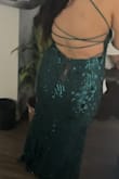 I do not shop online at all and I took my chance on this dress. It fits so perfectly I had space to breathe and it was not snugged. I don't have cleavage and it gave me a boost. It was beautiful I had so many compliments. I didn't take pictures but I did record a video when I first tried it on. The pictures Are not that great because it was a video and I had to screenshot it. I normally don't write reviews but I do read them so I thought it was important to post one because I absolutely love the dress and the way it fit I am a big girl - Christina G.